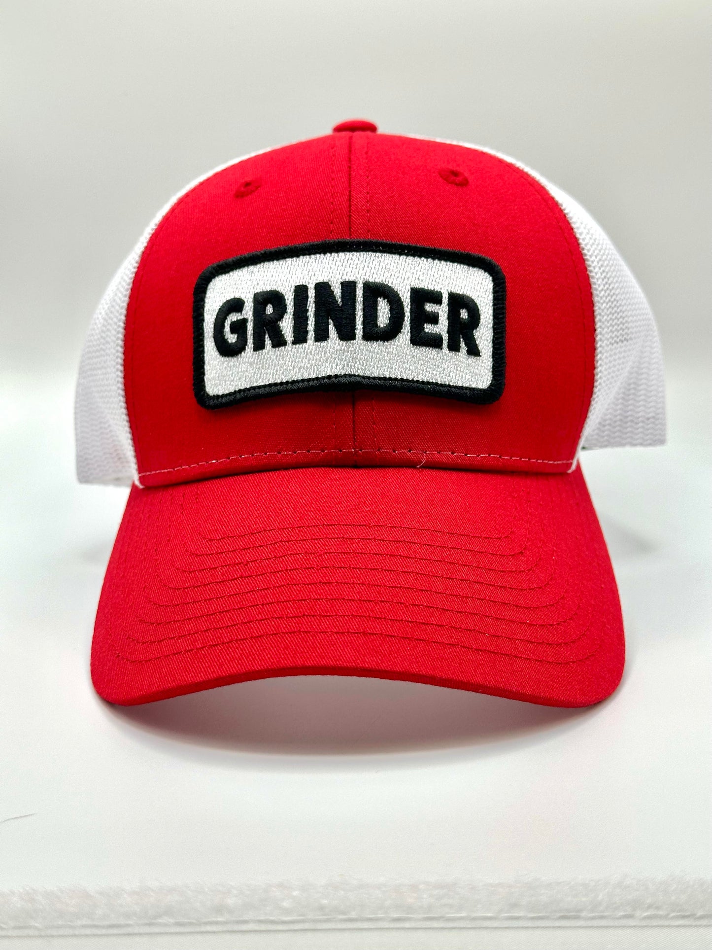 X Series: GRINDER Trucker Hat